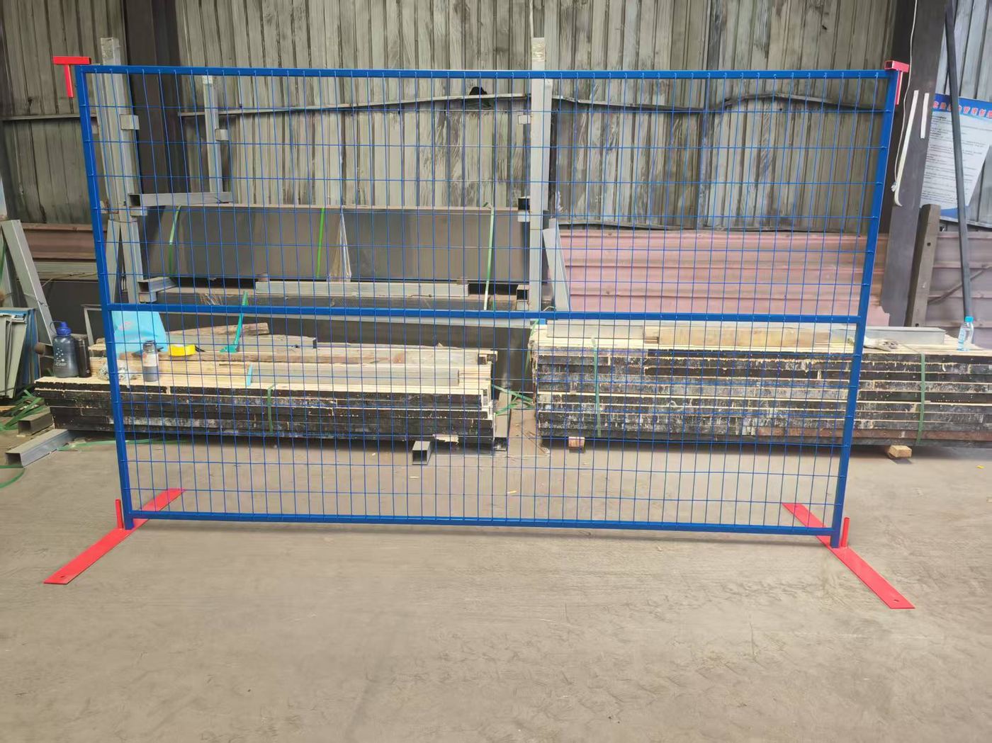 PVC-coated steel temporary fence panel with safety base ready for delivery